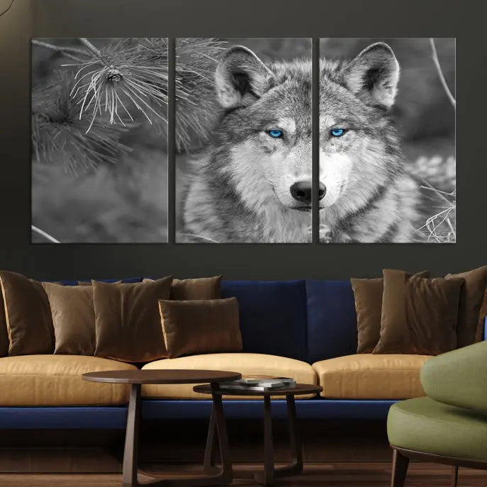 Displayed on the wall is the Wild Wolf Blue Eye Wall Art Canvas Print, a museum-quality triptych featuring a wolf with piercing blue eyes.