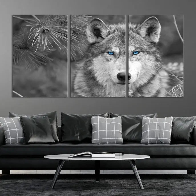 Displayed on the wall is the Wild Wolf Blue Eye Wall Art Canvas Print, a museum-quality triptych featuring a wolf with piercing blue eyes.