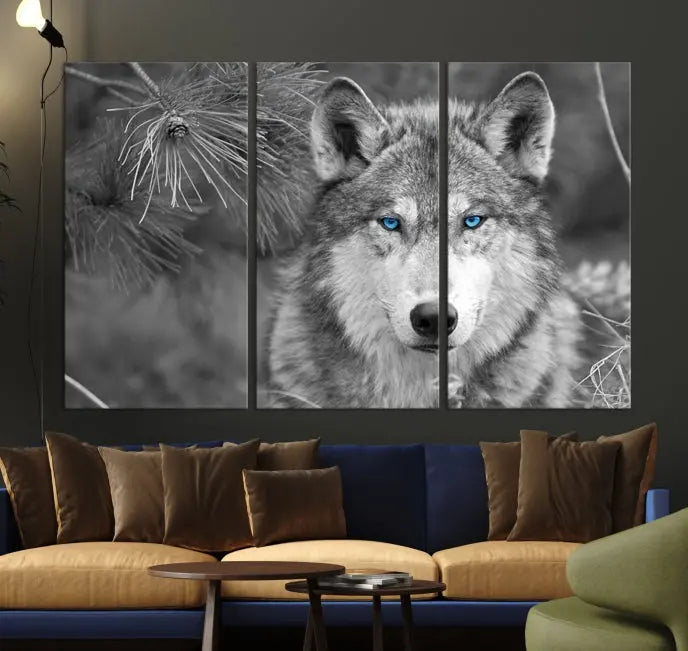 Displayed on the wall is the Wild Wolf Blue Eye Wall Art Canvas Print, a museum-quality triptych featuring a wolf with piercing blue eyes.