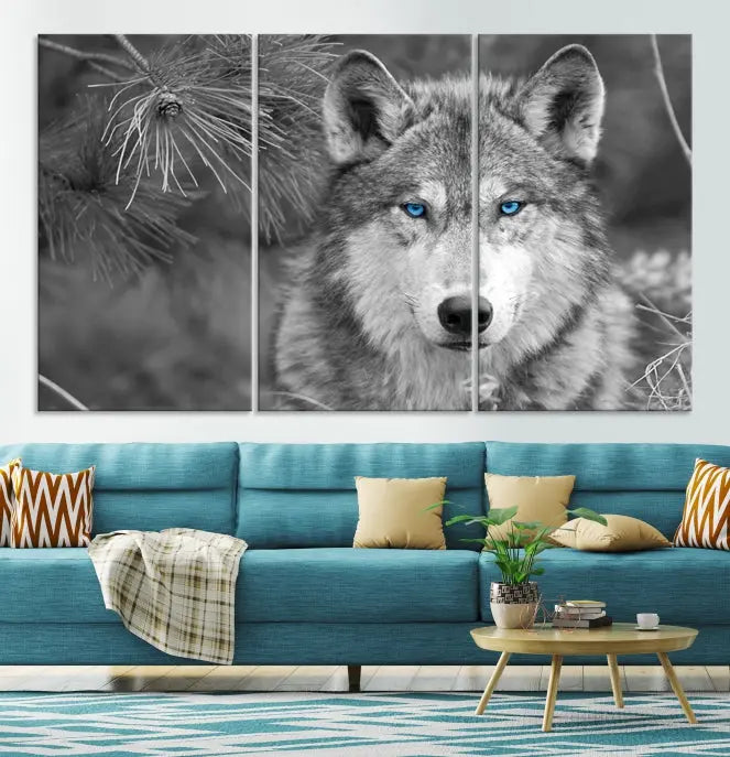 Displayed on the wall is the Wild Wolf Blue Eye Wall Art Canvas Print, a museum-quality triptych featuring a wolf with piercing blue eyes.