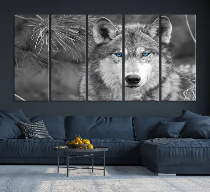 Displayed on the wall is the Wild Wolf Blue Eye Wall Art Canvas Print, a museum-quality triptych featuring a wolf with piercing blue eyes.