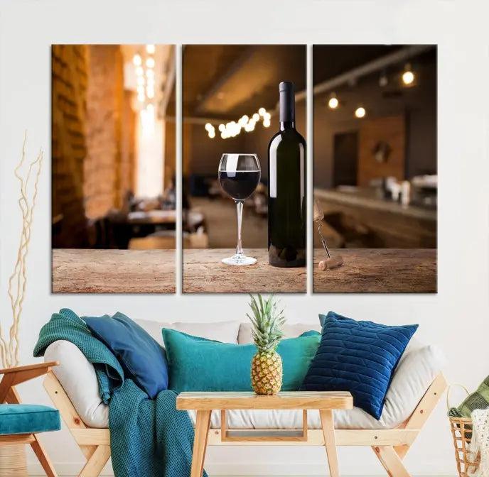 A museum-quality triptych Wall Art Canvas Print depicting a wine bottle and glass on a wooden table set against a cozy, blurred background, ready to hang.