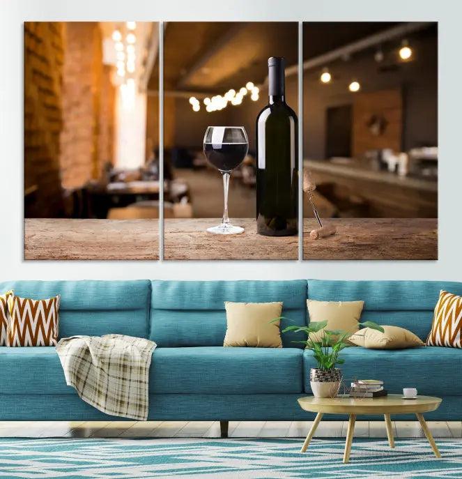 A museum-quality triptych Wall Art Canvas Print depicting a wine bottle and glass on a wooden table set against a cozy, blurred background, ready to hang.