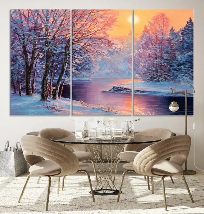 In a cozy living room, you'll find wall art titled "Winter Landscape Painting Wall Art Canvas Print," showcasing a serene snowy river scene at sunset on a museum-quality canvas with gallery-wrapped edges.