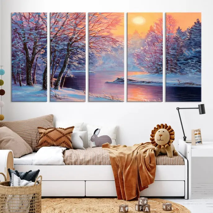 In a cozy living room, you'll find wall art titled "Winter Landscape Painting Wall Art Canvas Print," showcasing a serene snowy river scene at sunset on a museum-quality canvas with gallery-wrapped edges.