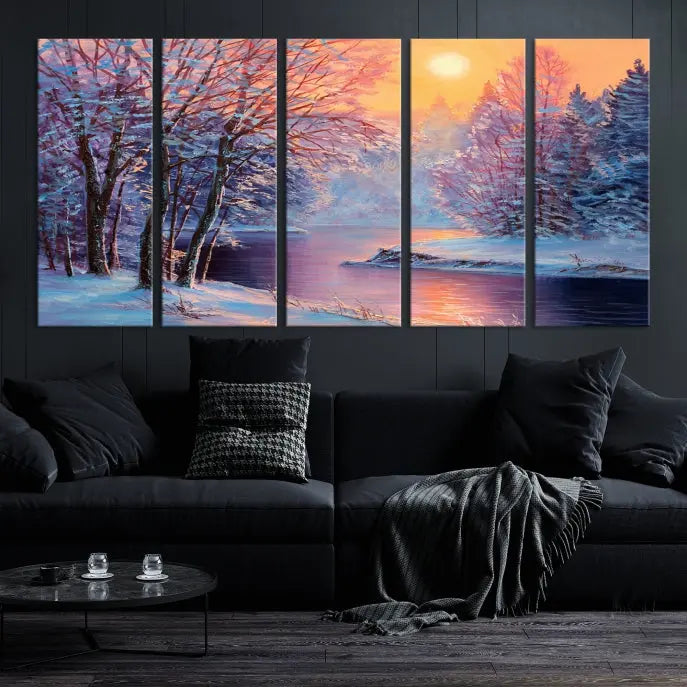 In a cozy living room, you'll find wall art titled "Winter Landscape Painting Wall Art Canvas Print," showcasing a serene snowy river scene at sunset on a museum-quality canvas with gallery-wrapped edges.