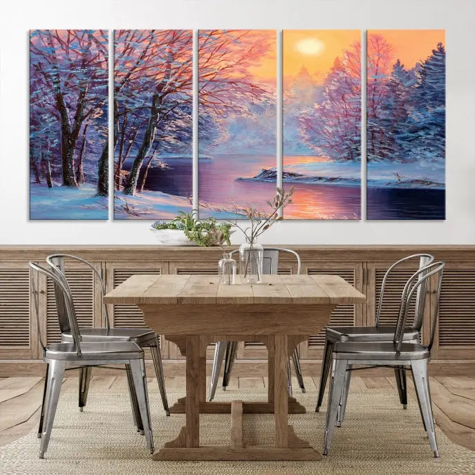 In a cozy living room, you'll find wall art titled "Winter Landscape Painting Wall Art Canvas Print," showcasing a serene snowy river scene at sunset on a museum-quality canvas with gallery-wrapped edges.