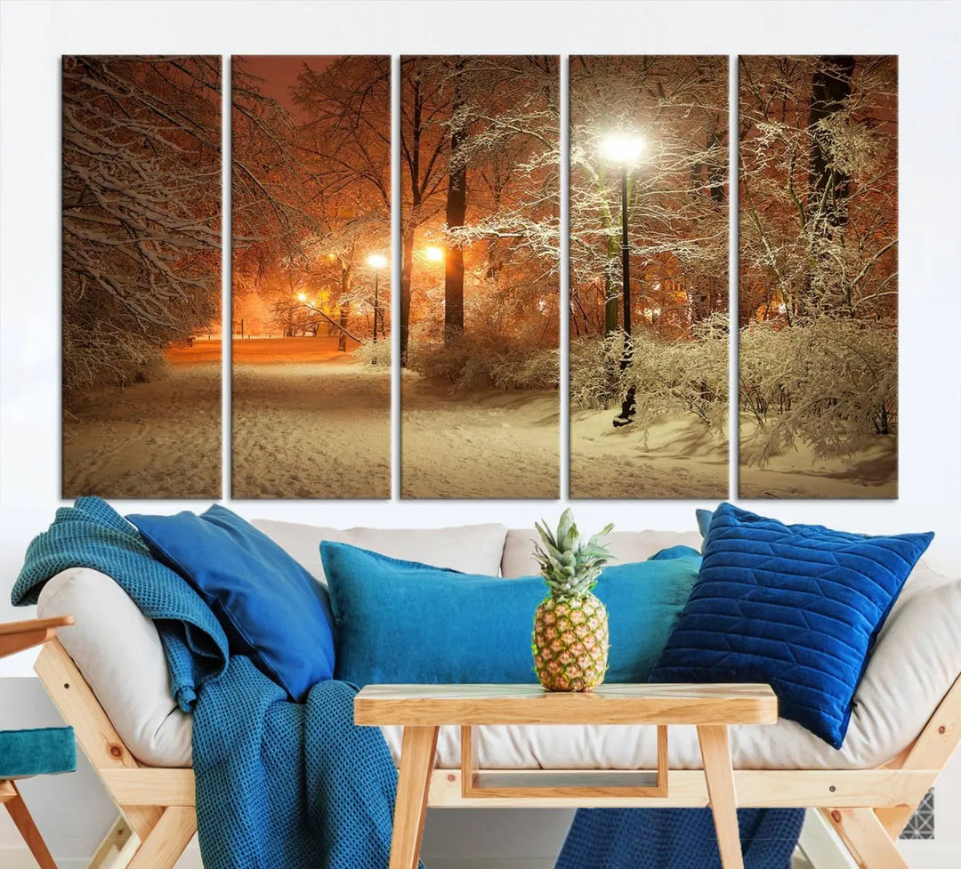 The "Winter and Park" wall art canvas print, showcasing a snowy path illuminated by glowing streetlights, adds museum-quality sophistication to the room.