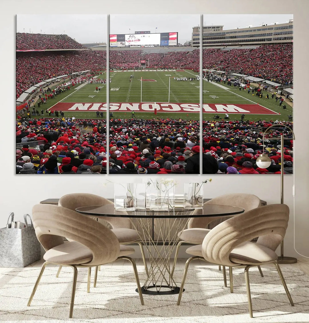 A living room exhibits the premium Wisconsin Badgers Football Team Print - Madison Camp Randall Stadium Wall Art Canvas Print, a triptych displaying an exciting game at Wisconsin. This canvas artwork infuses the space with vibrant energy.