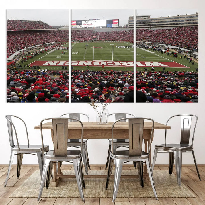 A living room exhibits the premium Wisconsin Badgers Football Team Print - Madison Camp Randall Stadium Wall Art Canvas Print, a triptych displaying an exciting game at Wisconsin. This canvas artwork infuses the space with vibrant energy.