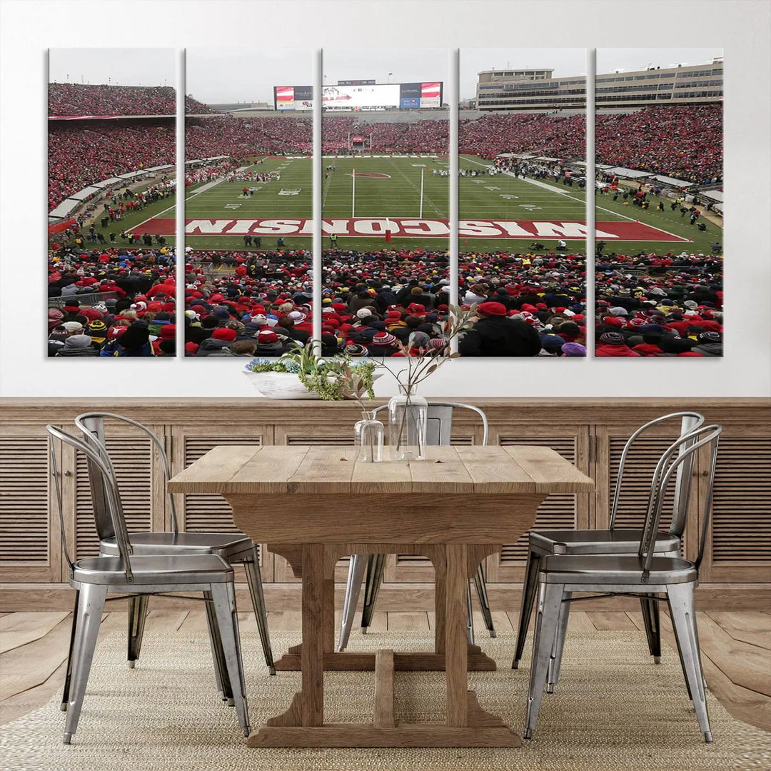 A living room exhibits the premium Wisconsin Badgers Football Team Print - Madison Camp Randall Stadium Wall Art Canvas Print, a triptych displaying an exciting game at Wisconsin. This canvas artwork infuses the space with vibrant energy.