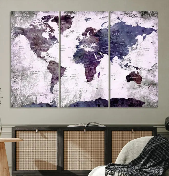 The World Map Grunge Canvas Print Wall Art, presented in five panels with a striking purple and white design, features museum-quality canvases with a gallery-wrapped finish. This treatment enhances their aesthetic appeal and ensures long-lasting durability.