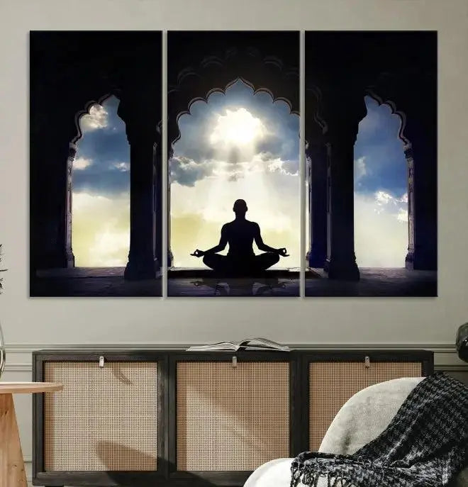 A triptych canvas print named "Women and Yoga Wall Art Canvas Print" beautifully captures a woman meditating in a temple against a backdrop of cloudy skies, showcasing graceful yoga poses. This serene artwork is displayed elegantly.