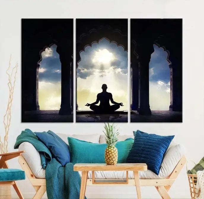 A triptych canvas print named "Women and Yoga Wall Art Canvas Print" beautifully captures a woman meditating in a temple against a backdrop of cloudy skies, showcasing graceful yoga poses. This serene artwork is displayed elegantly.