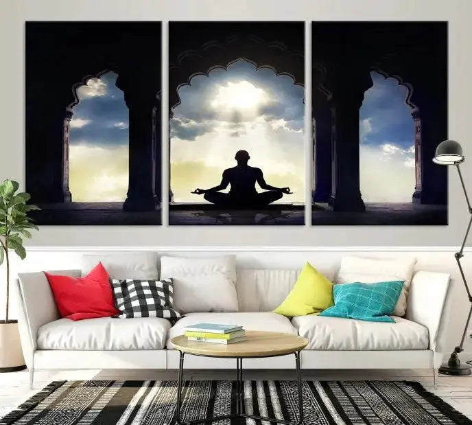 A triptych canvas print named "Women and Yoga Wall Art Canvas Print" beautifully captures a woman meditating in a temple against a backdrop of cloudy skies, showcasing graceful yoga poses. This serene artwork is displayed elegantly.