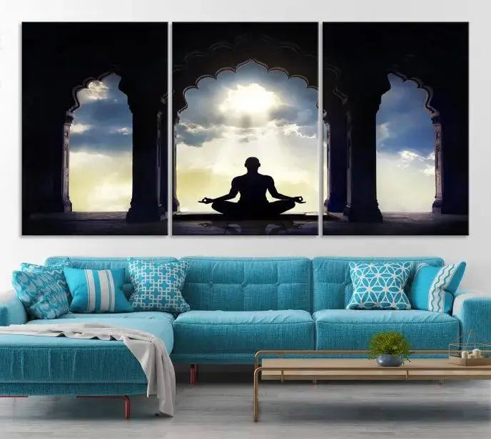 A triptych canvas print named "Women and Yoga Wall Art Canvas Print" beautifully captures a woman meditating in a temple against a backdrop of cloudy skies, showcasing graceful yoga poses. This serene artwork is displayed elegantly.