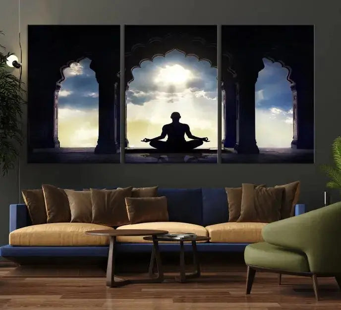 A triptych canvas print named "Women and Yoga Wall Art Canvas Print" beautifully captures a woman meditating in a temple against a backdrop of cloudy skies, showcasing graceful yoga poses. This serene artwork is displayed elegantly.