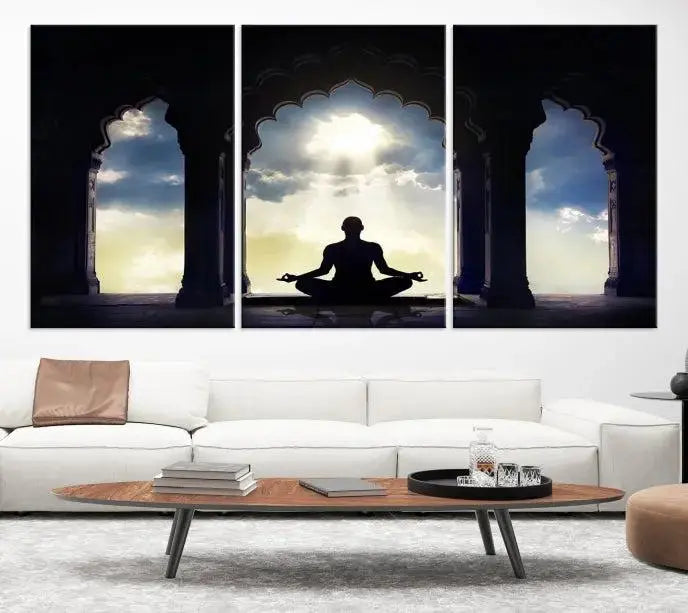 A triptych canvas print named "Women and Yoga Wall Art Canvas Print" beautifully captures a woman meditating in a temple against a backdrop of cloudy skies, showcasing graceful yoga poses. This serene artwork is displayed elegantly.