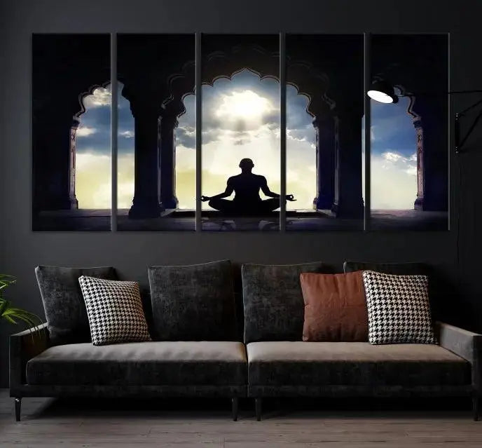 A triptych canvas print named "Women and Yoga Wall Art Canvas Print" beautifully captures a woman meditating in a temple against a backdrop of cloudy skies, showcasing graceful yoga poses. This serene artwork is displayed elegantly.