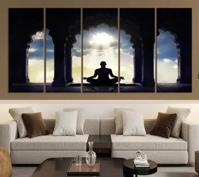 A triptych canvas print named "Women and Yoga Wall Art Canvas Print" beautifully captures a woman meditating in a temple against a backdrop of cloudy skies, showcasing graceful yoga poses. This serene artwork is displayed elegantly.