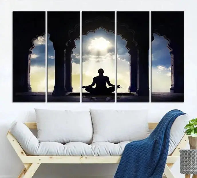 A triptych canvas print named "Women and Yoga Wall Art Canvas Print" beautifully captures a woman meditating in a temple against a backdrop of cloudy skies, showcasing graceful yoga poses. This serene artwork is displayed elegantly.