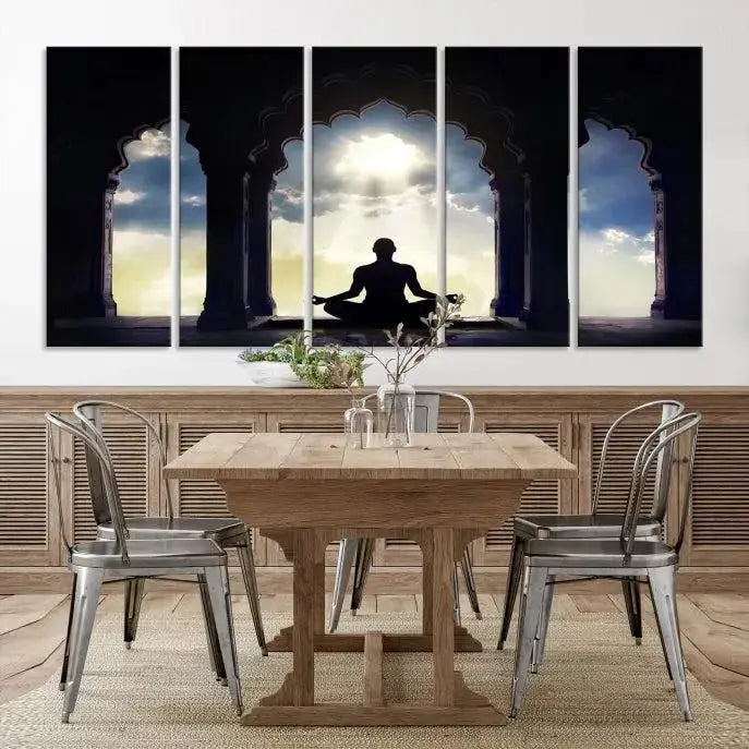 A triptych canvas print named "Women and Yoga Wall Art Canvas Print" beautifully captures a woman meditating in a temple against a backdrop of cloudy skies, showcasing graceful yoga poses. This serene artwork is displayed elegantly.