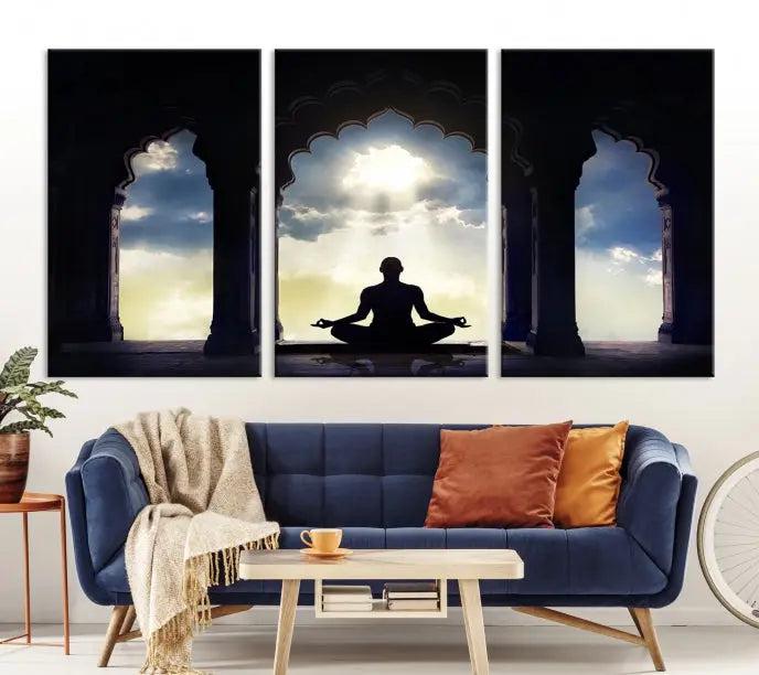 A triptych canvas print named "Women and Yoga Wall Art Canvas Print" beautifully captures a woman meditating in a temple against a backdrop of cloudy skies, showcasing graceful yoga poses. This serene artwork is displayed elegantly.