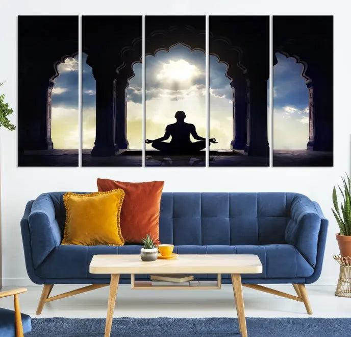 A triptych canvas print named "Women and Yoga Wall Art Canvas Print" beautifully captures a woman meditating in a temple against a backdrop of cloudy skies, showcasing graceful yoga poses. This serene artwork is displayed elegantly.