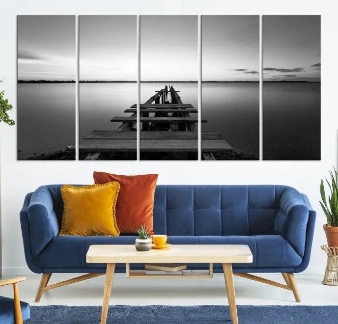 The "Wood Pier and Sea" wall art canvas print is a triptych featuring a wooden dock stretching into a serene lake, beautifully presented on gallery-wrapped museum-quality canvas.