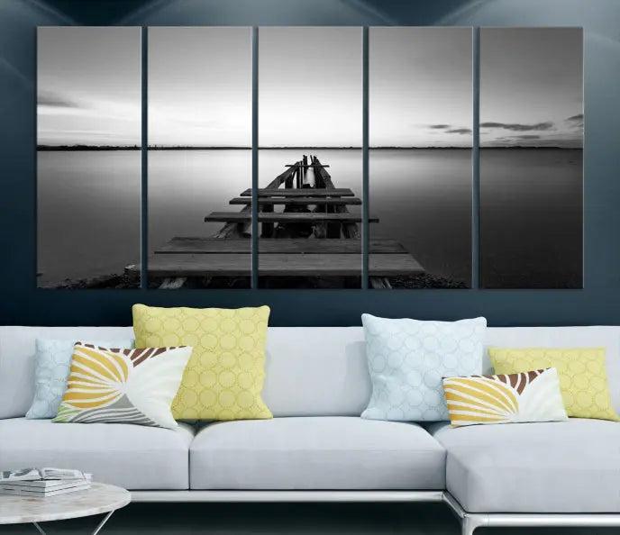 The "Wood Pier and Sea" wall art canvas print is a triptych featuring a wooden dock stretching into a serene lake, beautifully presented on gallery-wrapped museum-quality canvas.