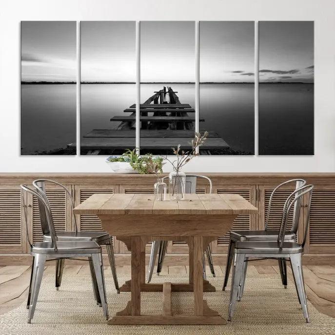 The "Wood Pier and Sea" wall art canvas print is a triptych featuring a wooden dock stretching into a serene lake, beautifully presented on gallery-wrapped museum-quality canvas.