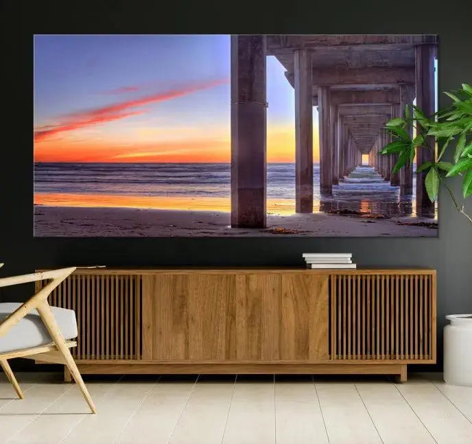 The wall is graced by the "Wood Pier on the Ocean" artwork, crafted on museum-quality canvases, ensuring long-lasting beauty with its UV-protective coating.