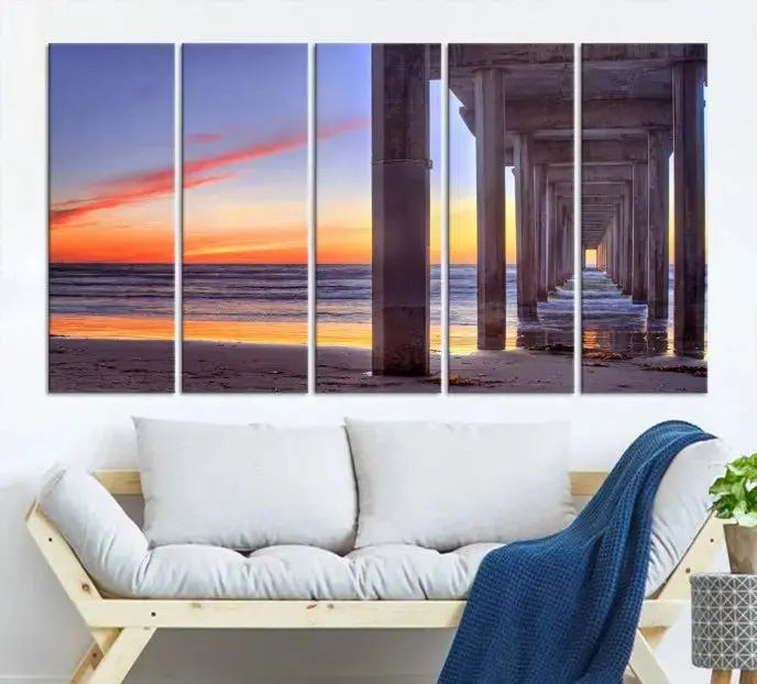 The wall is graced by the "Wood Pier on the Ocean" artwork, crafted on museum-quality canvases, ensuring long-lasting beauty with its UV-protective coating.