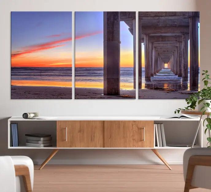 The wall is graced by the "Wood Pier on the Ocean" artwork, crafted on museum-quality canvases, ensuring long-lasting beauty with its UV-protective coating.