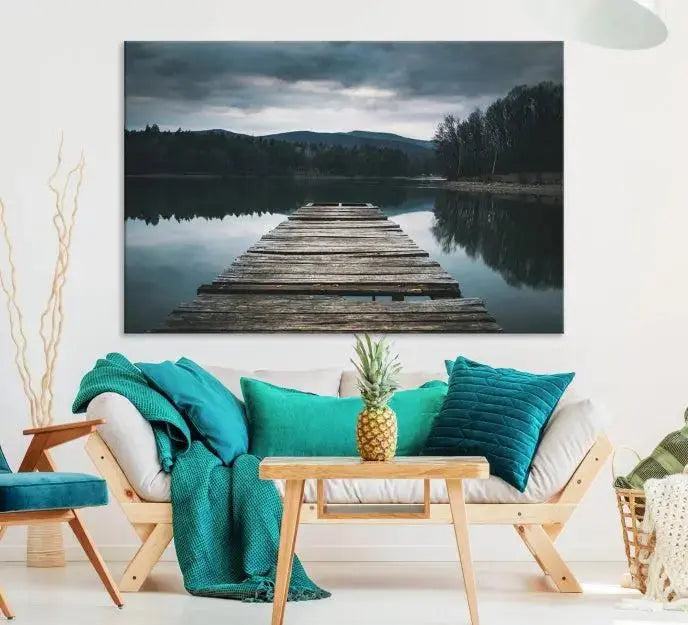 A serene triptych featuring the "Wooden Bridge Near Lake Wall Art Canvas Print" is showcased, depicting a tranquil lake with a wooden pier amidst trees and mountains on museum-quality canvas.