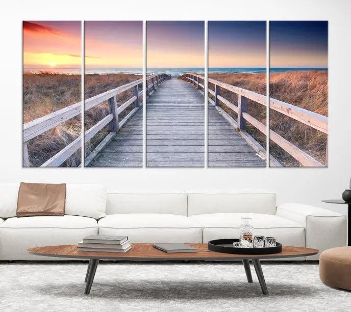 **Title:** Wooden Path at Baltic Sea Wall Art Canvas Print

**Description:** A triptych depicting a wooden boardwalk leading to a beach at sunset. This museum-quality canvas is ready to hang, offering an effortless enhancement to your decor.