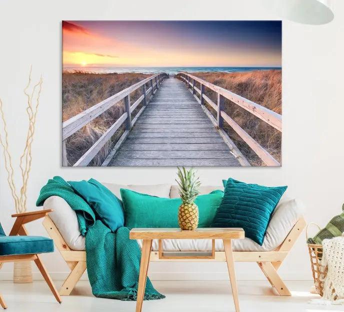 **Title:** Wooden Path at Baltic Sea Wall Art Canvas Print

**Description:** A triptych depicting a wooden boardwalk leading to a beach at sunset. This museum-quality canvas is ready to hang, offering an effortless enhancement to your decor.