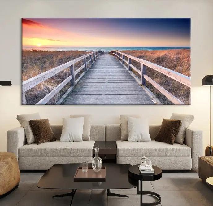 **Title:** Wooden Path at Baltic Sea Wall Art Canvas Print

**Description:** A triptych depicting a wooden boardwalk leading to a beach at sunset. This museum-quality canvas is ready to hang, offering an effortless enhancement to your decor.