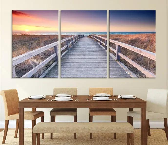 **Title:** Wooden Path at Baltic Sea Wall Art Canvas Print

**Description:** A triptych depicting a wooden boardwalk leading to a beach at sunset. This museum-quality canvas is ready to hang, offering an effortless enhancement to your decor.