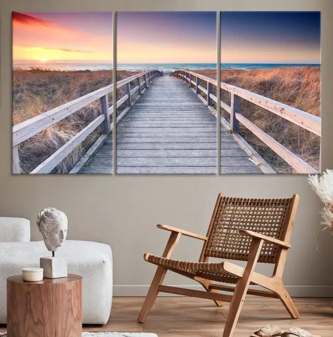 **Title:** Wooden Path at Baltic Sea Wall Art Canvas Print

**Description:** A triptych depicting a wooden boardwalk leading to a beach at sunset. This museum-quality canvas is ready to hang, offering an effortless enhancement to your decor.