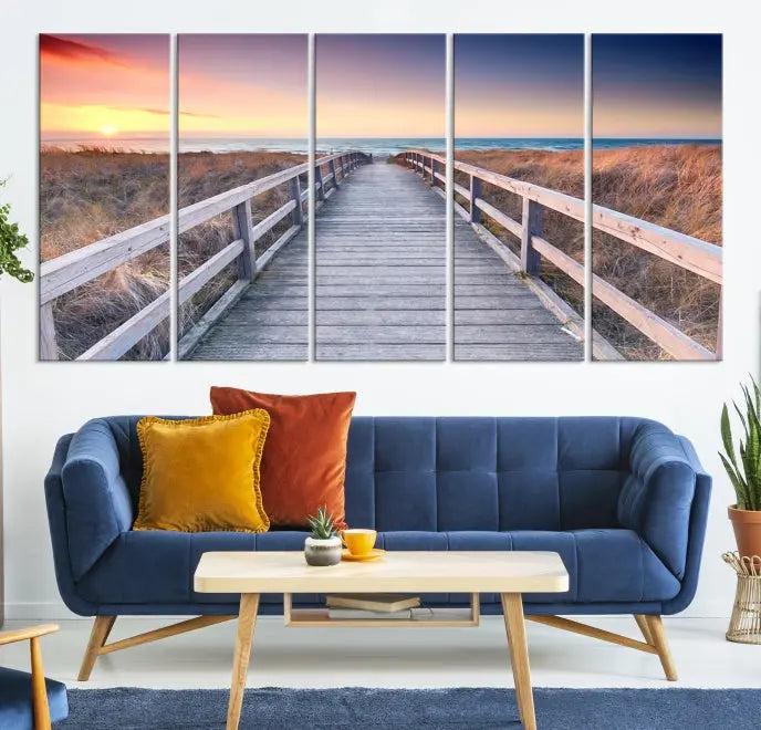 **Title:** Wooden Path at Baltic Sea Wall Art Canvas Print

**Description:** A triptych depicting a wooden boardwalk leading to a beach at sunset. This museum-quality canvas is ready to hang, offering an effortless enhancement to your decor.