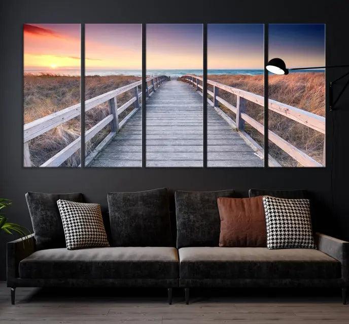 **Title:** Wooden Path at Baltic Sea Wall Art Canvas Print

**Description:** A triptych depicting a wooden boardwalk leading to a beach at sunset. This museum-quality canvas is ready to hang, offering an effortless enhancement to your decor.