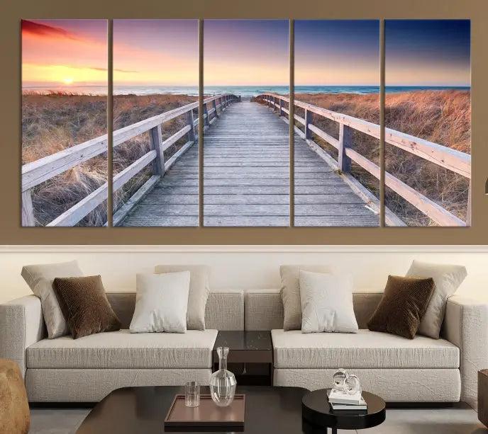 **Title:** Wooden Path at Baltic Sea Wall Art Canvas Print

**Description:** A triptych depicting a wooden boardwalk leading to a beach at sunset. This museum-quality canvas is ready to hang, offering an effortless enhancement to your decor.