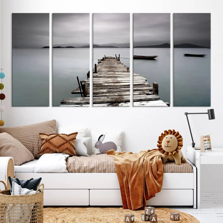 A serene triptych featuring a wooden pier stretching into misty waters brings the Wooden Pier Canvas Wall Art Beach Canvas Artwork Print to life.