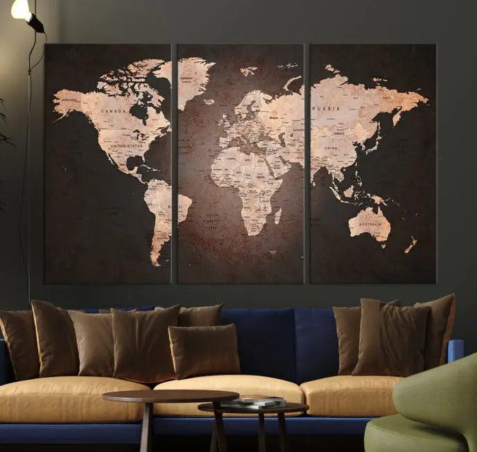 A World Map Canvas Print with a vintage design enhances the dark wall. This three-panel artwork is crafted on museum-quality canvases, gallery wrapped, and features a UV-protective coating for enduring brilliance.