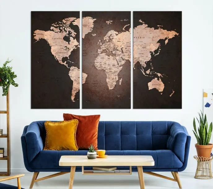 A World Map Canvas Print with a vintage design enhances the dark wall. This three-panel artwork is crafted on museum-quality canvases, gallery wrapped, and features a UV-protective coating for enduring brilliance.