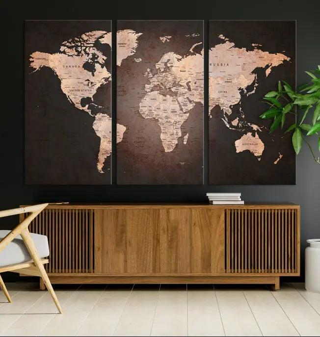 A World Map Canvas Print with a vintage design enhances the dark wall. This three-panel artwork is crafted on museum-quality canvases, gallery wrapped, and features a UV-protective coating for enduring brilliance.