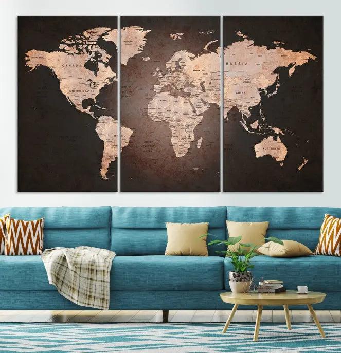 A World Map Canvas Print with a vintage design enhances the dark wall. This three-panel artwork is crafted on museum-quality canvases, gallery wrapped, and features a UV-protective coating for enduring brilliance.