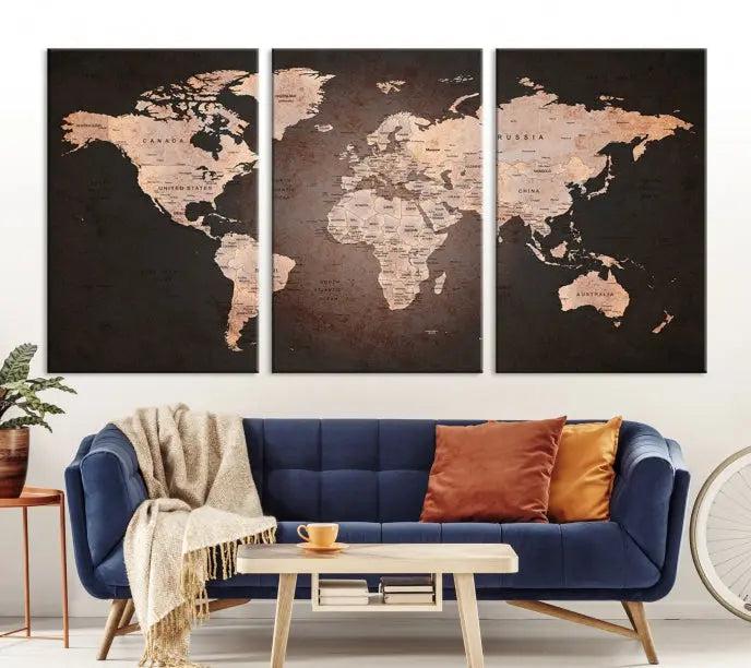 A World Map Canvas Print with a vintage design enhances the dark wall. This three-panel artwork is crafted on museum-quality canvases, gallery wrapped, and features a UV-protective coating for enduring brilliance.