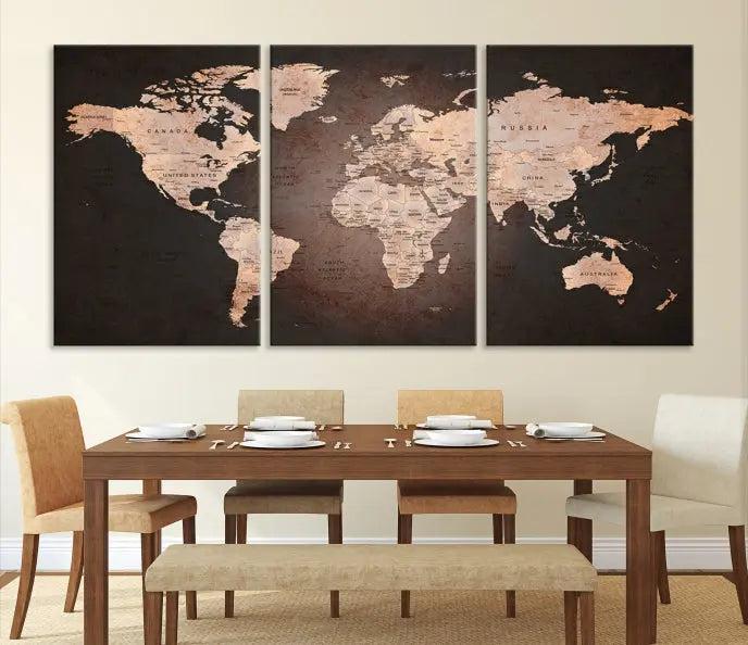 A World Map Canvas Print with a vintage design enhances the dark wall. This three-panel artwork is crafted on museum-quality canvases, gallery wrapped, and features a UV-protective coating for enduring brilliance.